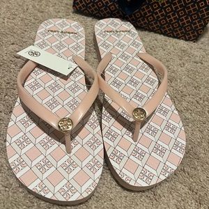 Tory Burch flip flops, brand new with tag.